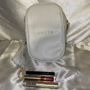 Stila crossbody with 3 travel sized items